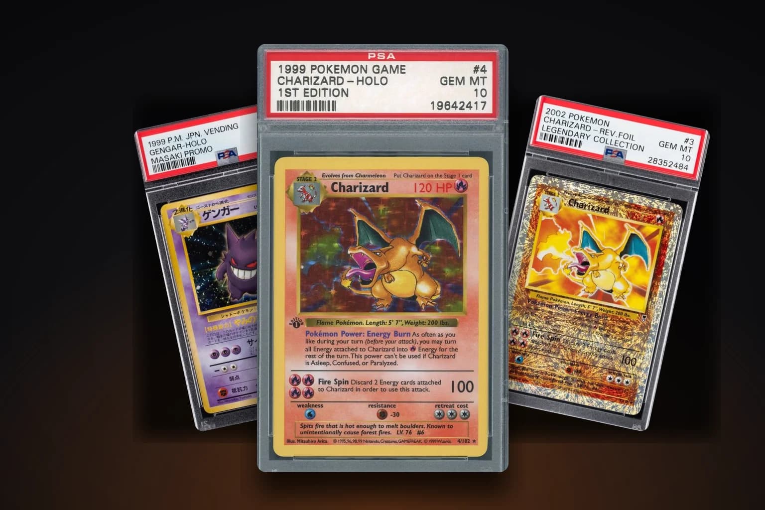 A 1999 1st Edition Base Set Charizard PSA 10 graded slab flanked by two more graded Pokémon slabs